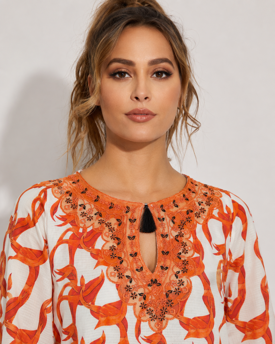 Orange Floral Printed 2-Piece Kurta Set with Embroidered Neckline